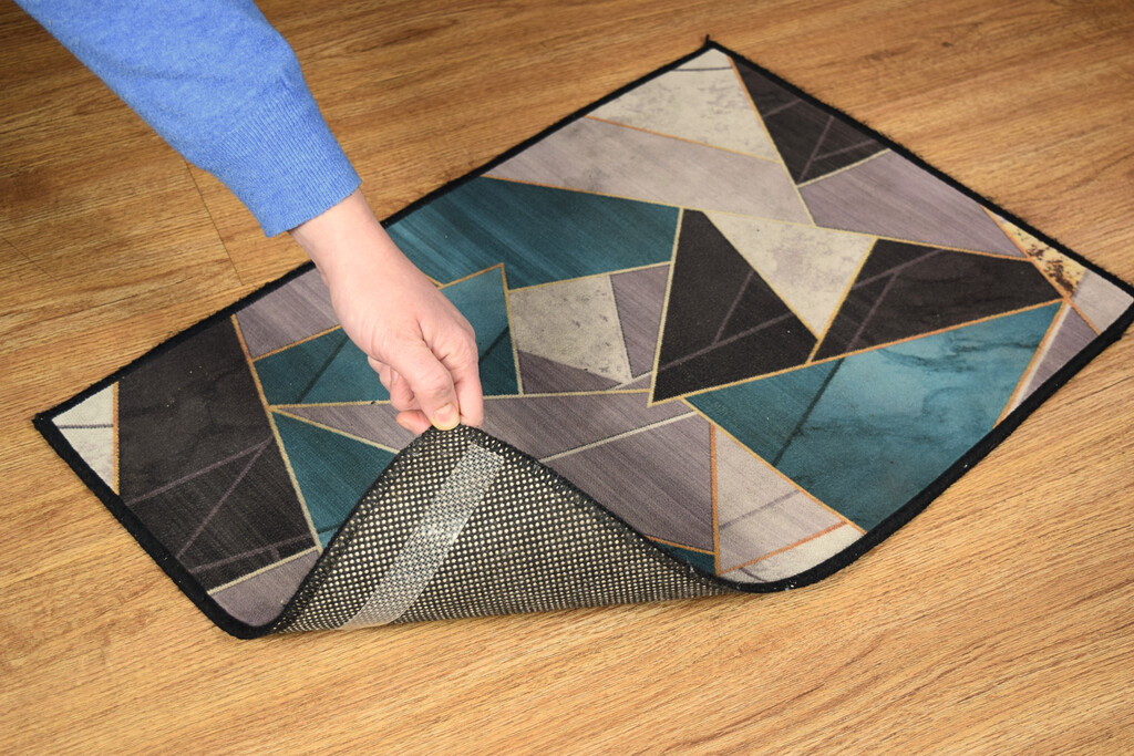 Tapis maintenu au sol avec adh'IT